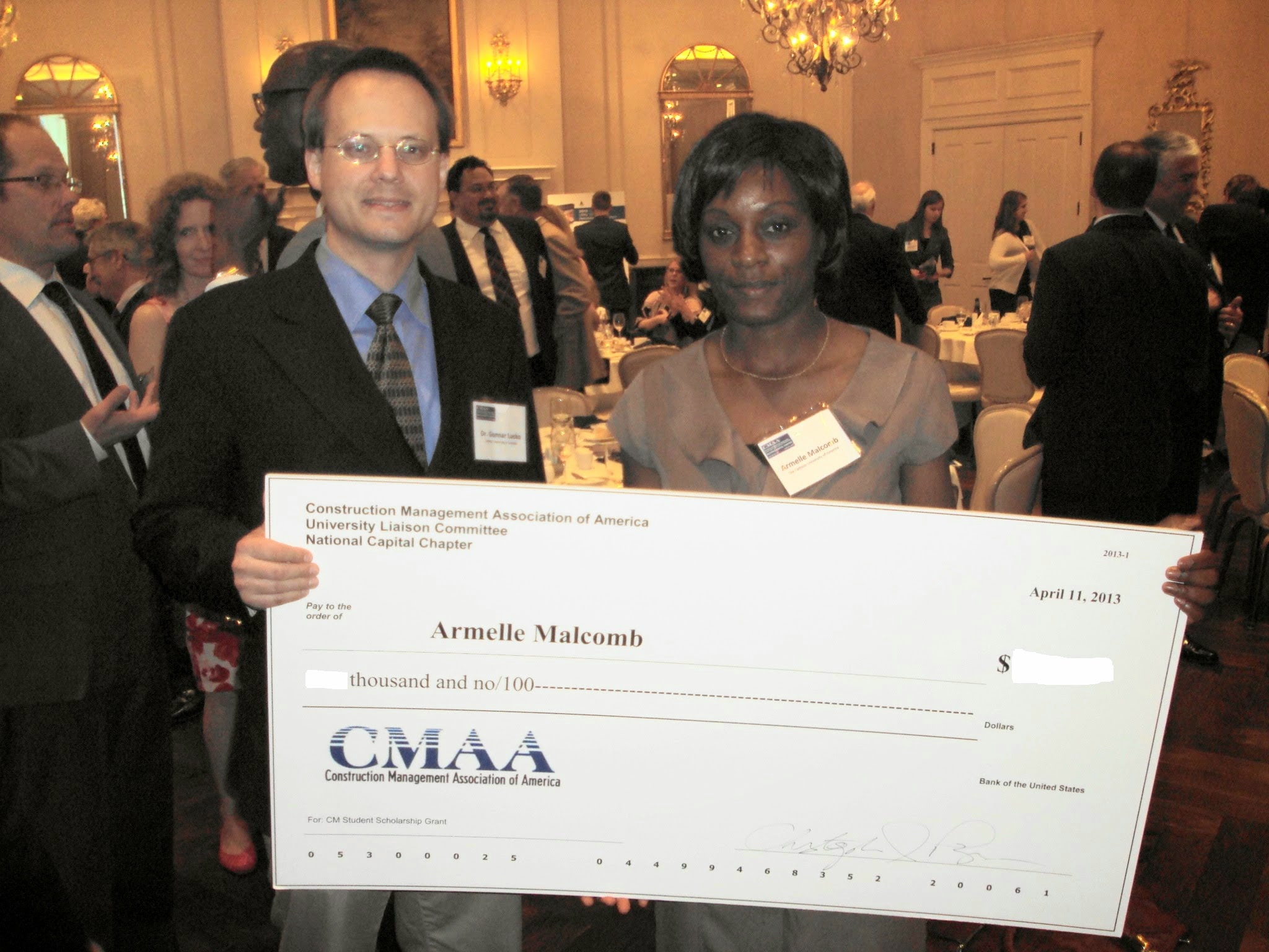 CMAA Check Presentation: Honored to receive industry recognition alongside my mentor,Professor Gunnar Lucko, F.ASCE.